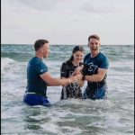 This high school student was excited to participate in a beach side baptism service in Panama City, Florida.