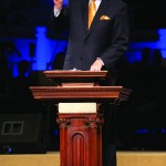 Lane Moore, NWLBA Director of Missions, stands behind the pulpit while detailing the impact M.E. Dodd had in helping to establish the Cooperative Program. Doug Collier photo