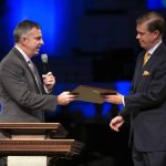 Steve Horn, executive director for Louisiana Baptists, presented NWLBA Director of Missions Lane Moore with a plaque during a special 50th anniversary celebration of the association.