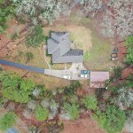 An aerial photograph showed the proximity of downed trees to the home of Gevan Spinney, pastor of First Baptist Church in Haughton.