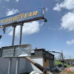 A fallen pole and other debris rest beside a business in Lake Charles. Brian Blackwell photo/Taken Sept. 2.