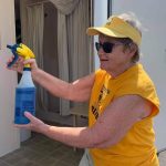 A Florida Baptist Disaster Relief team member cleaned inside a shower trailer at First Baptist Church in Moss Bluff. Brian Blackwell photo/Taken Sept. 2.