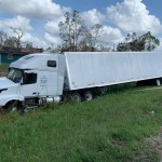 An 18-wheeler was knocked off I-10 by Hurricane Laura's high winds. Brian Blackwell photo/Sept. 2.
