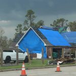 A blue tarp covered a house in Lake Charles. John Marcase photo/Taken Sept. 5.