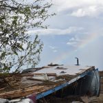 A car was turned sideways up and under debris in Cameron. Norm Miller photo/Taken Sept. 12.
