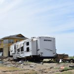 A camper was parked near a home in the heavily damaged area near Cameron. Norm Miller photo/Taken Sept. 13.