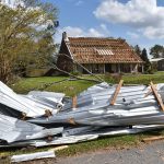 Homes like this one in Westlake sustained heavy roof damage from Hurricane Laura. Brian Blackwell photo/Sept. 3.