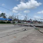 Telephone poles covered a roadway in downtown Lake Charles. Brian Blackwell photo/Sept. 2.