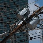 High winds from Hurricane Laura damaged an Entergy power line in downtown Lake Charles. Entergy photo/Sept. 4.