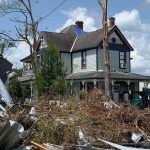 Debris covered the front lawn of this home in Vinton. Philip Timothy photo/Taken Sept. 3.