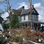 Debris covered the front lawn of this home in Vinton. Philip Timothy photo/Taken Sept. 3.