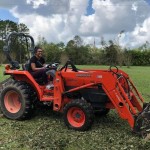 An LSU BCM member clears debris from a home in Longville. Steve Masters photo/Taken Aug. 30.