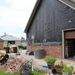 A home in Lake Charles had its bricks ripped away by Laura's winds. John Marcase photo/Sept. 5.