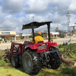 A South Carolina Disaster Relief team member drove a tractor. SBC photo/Taken Aug. 31.