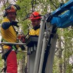Scott Belmore, University of Alaska-Anchorage Mosaic campus ministry director, directs a student at a site in Rapides Parish. Mosaic photo