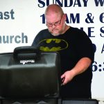 Chad Triche, a member of Gulf Coast Baptist Church in Golden Meadow, grilled chicken to feed members of his community Sept. 1, 2021. Brian Blackwell photo