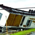 This mobile home was overturned by Ida's high winds. Baptist Message photo