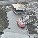 A boat was turned sideways in Grand Isle after Ida passed through the community. Louisiana Governor's Office of Homeland Security and Emergency Preparedness