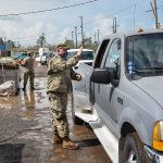 Airmen from the 159th Fighter Wing, Louisiana Air National Guard, manned Points of Distribution (POD) sites distributing food, water, ice and tarps to residents in Raceland, Louisiana. POD members adhered to COVID-19 protocols while ensuring those in need received essential supplies to help alleviate the burden following Hurricane Ida. U.S. Air National Guard Staff Sgt. Ryan J. Sonnier photo