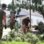 Members of the 202nd Rapid Engineer Deployable Heavy Operational Repair Squadron Engineers (Red Horse) partnered with the 159th Civil Engineering Squadron and New Orleans Parks and Parkways to clear debris from roadways in New Orleans. Red Horse, from Camp Blanding, Fla., is a specialized, highly mobile civil engineering team comprised of Florida Army and Air National Guardsmen that provides rapid response capabilities for multiple worldwide contingencies and operations. U.S. Air Force Capt. Larissa Lambert photo