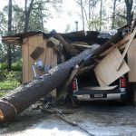 An Arkansas Baptist Disaster Relief team member moved debris in Independence. Patrick Dennis photo
