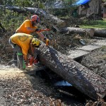Arkansas Baptist Disaster Relief team members moved debris near Hammond. Patrick Dennis photo