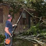 Mississippi Baptist Disaster Relief team members moved debris in Lacombe. Patrick Dennis photo