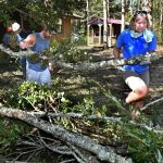 Mississippi Baptist Disaster Relief team members moved debris in Lacombe. Patrick Dennis photo