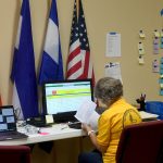 A Southern Baptist Disaster Relief team member looks sorted through information at First Baptist Church in Mandeville. Patrick Dennis photo