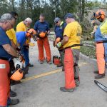 Texas Baptist Disaster Relief team members prayed at New River Baptist Church in St. Amant. Patrick Dennis photo