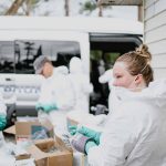 Before entering a church that had been flooded during Hurricane Ida, volunteers had to don protective gear in order to protect them from the mold and mildew within the structure. TAB Media photo