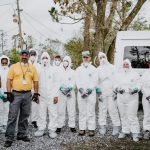 A group of college students from the Baptist Student Union at Hinds Community College in Raymond, Mississippi, donned protective gear as they prepared to assist Rob Bline of California Southern Baptist Disaster Relief Ministries in Bourg.