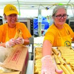 Oklahoma Baptist Disaster Relief team members Janie Smith and Lori Williams prepared enchiladas for meals that were served to those impacted by Hurricane Ida. Brian Blackwell photo