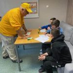 A Louisiana Baptist Disaster Relief team member visits with Ukrainian children staying at First Baptist Church, Gdansk, Poland.