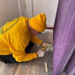 A Louisiana Baptist Disaster Relief team member worked on a door in an apartment that will house Ukrainian refugees at First Baptist Church, Gdansk, Poland.