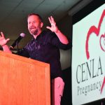 CENLA Pregnancy Center keynote speaker Kirk Cameron encourages the crowd to stand for life.