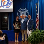 The family of the late Blake Cooper accepted his LCU distinguished alumni award.