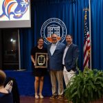The family of the late Blake Cooper accepted his LCU distinguished alumni award.