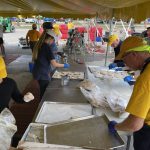 Rolling Hills feeding unit team members prepare food that is served to residents impacted by Hurricane Ian in Naples, Florida.