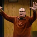 A pastor participates in a time of worship at the Pastors Conference.