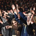 Students participate in a time of worship at YEC.