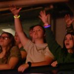 Students participate in a time of worship at YEC.