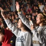Students participate in a time of worship at YEC.