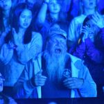 Pastor Bryan Canup participates in a time of worship at YEC.