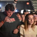 Students participate in a time of worship at YEC.