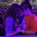 Students pray for their lost friends and other needs during the closing session of YEC.