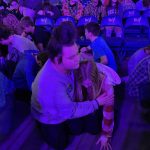 Students pray for their lost friends and other needs during the closing session of YEC.