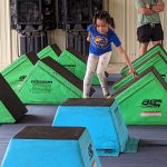 A youngster navigated through an obstacle course.