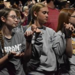 Students lifted their hands in prayer at the Big Creek Baptist Association Revival.