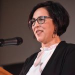 Gift of Life banquet emcee Claire Lemoine, welcomes the crowd to the event.